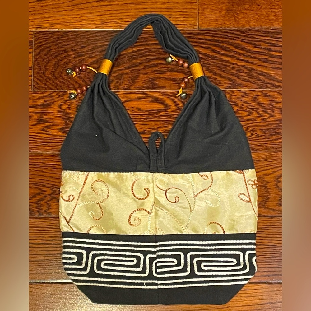 Eclectic light weight cloth purse.